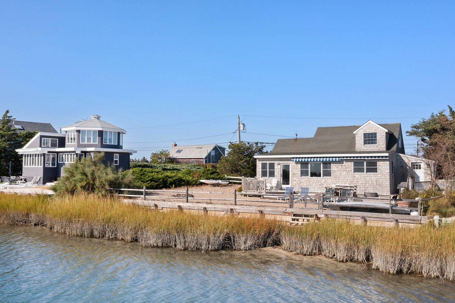 Panoramic Waterfront Vistas in a Coveted Harborside Neighborhood