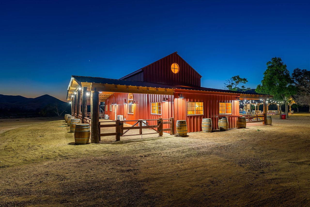 Rustic barn event space on a Los Angeles vineyard estate, ideal for memorable events.