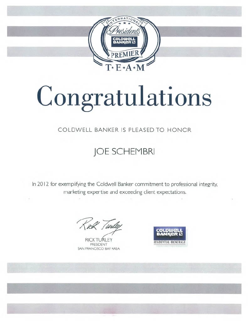  A white certificate with a "Coldwell Banker International President's Premier Team" seal at the top.