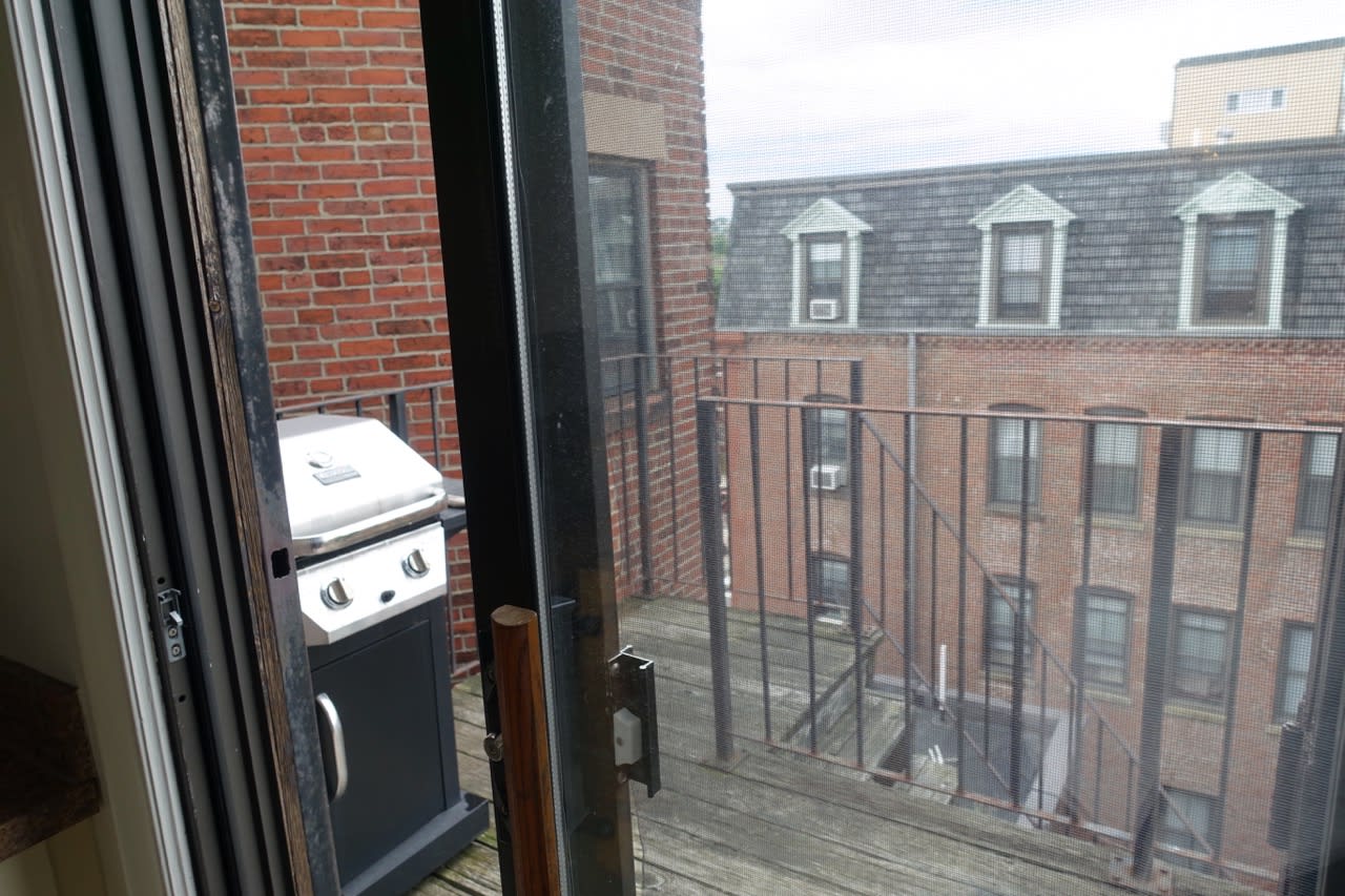 Unique Penthouse 1 bed w/ 2 Decks, exposed brick and laundry in unit! 