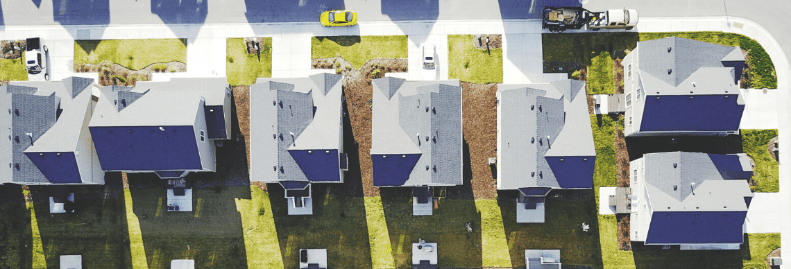 a neighborhood layout, offering a top-down perspective of houses arranged along a street. 