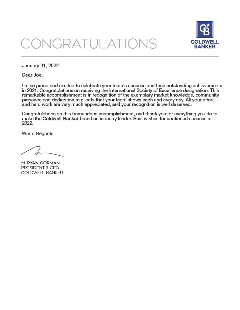 The letter, addressed to "Dear Joe," is signed by M. Ryan Gorman, President & CEO of Coldwell Banker. It congratulates Joe and his team on their success and outstanding achievements in 2021, specifically for receiving the International Society of Excellence designation. 