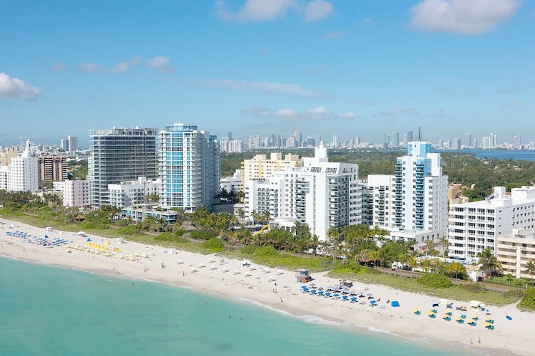 The beach and the high buildings in Miami Beach.