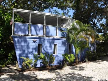 Sarasota's Nautical Charm: A Boat and Lighthouse