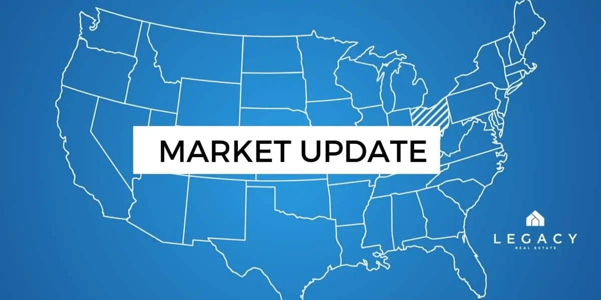 Blue map of the united states with black text on a white backgournd stating 'Market Update' with the Legacy Real Estate logo in the bottom right corner