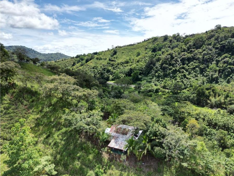 Farm with Mountain Range and River