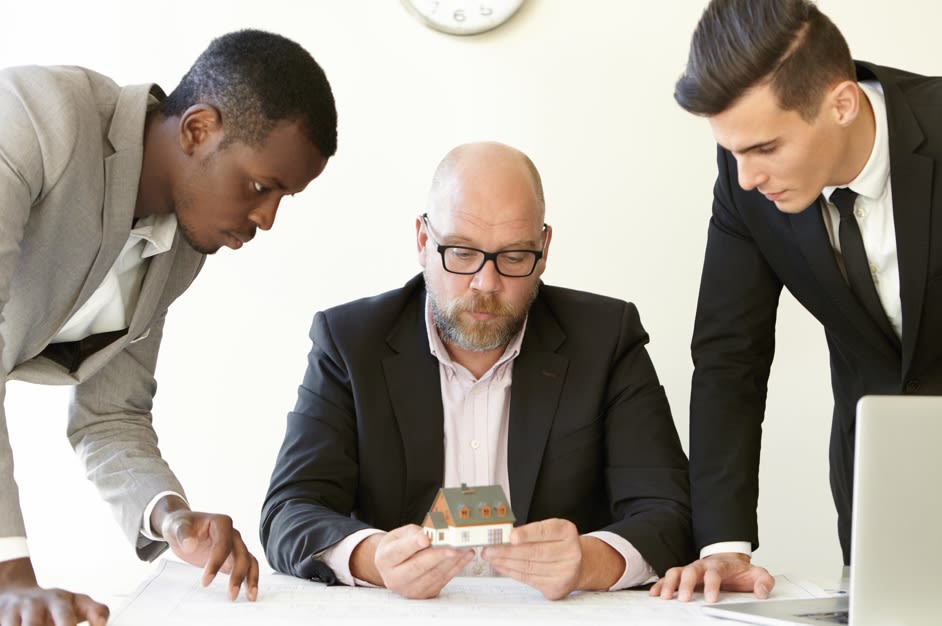 three man deciding for home structure