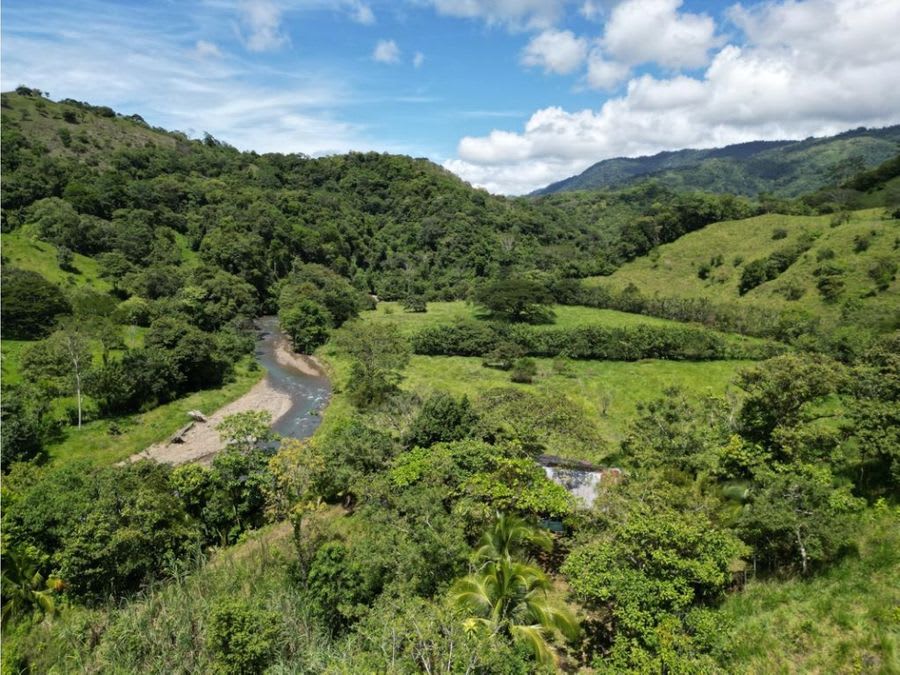 Farm with Mountain Range and River