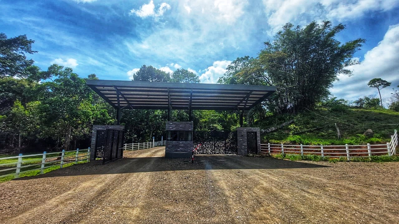 Exclusive Two-Lot Oasis: Your Dream Home Awaits in Gated Paradise!