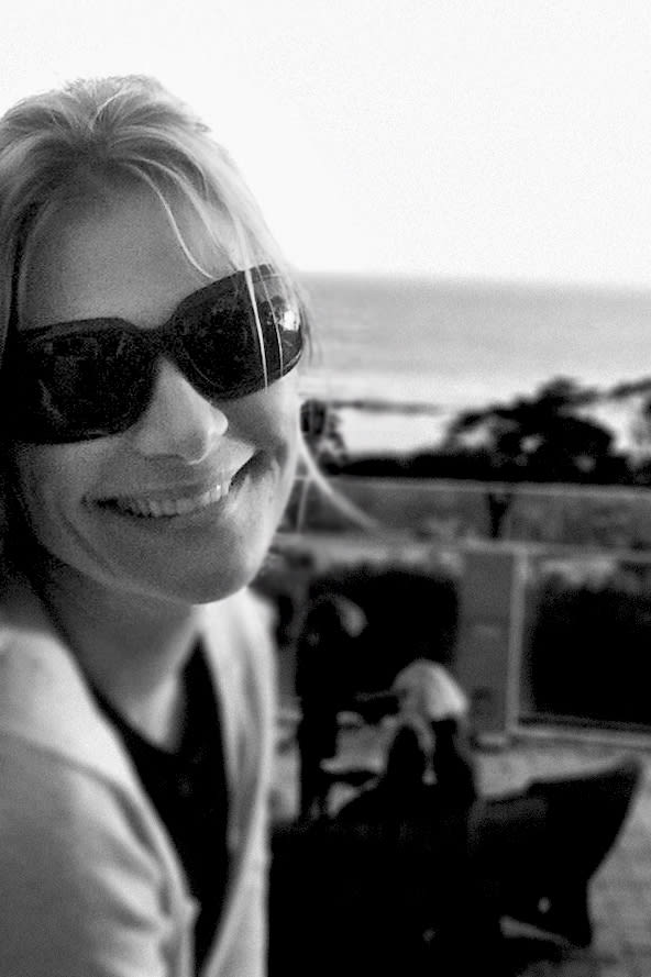 black and white profile photo of transaction coordinator Brenna Gardner