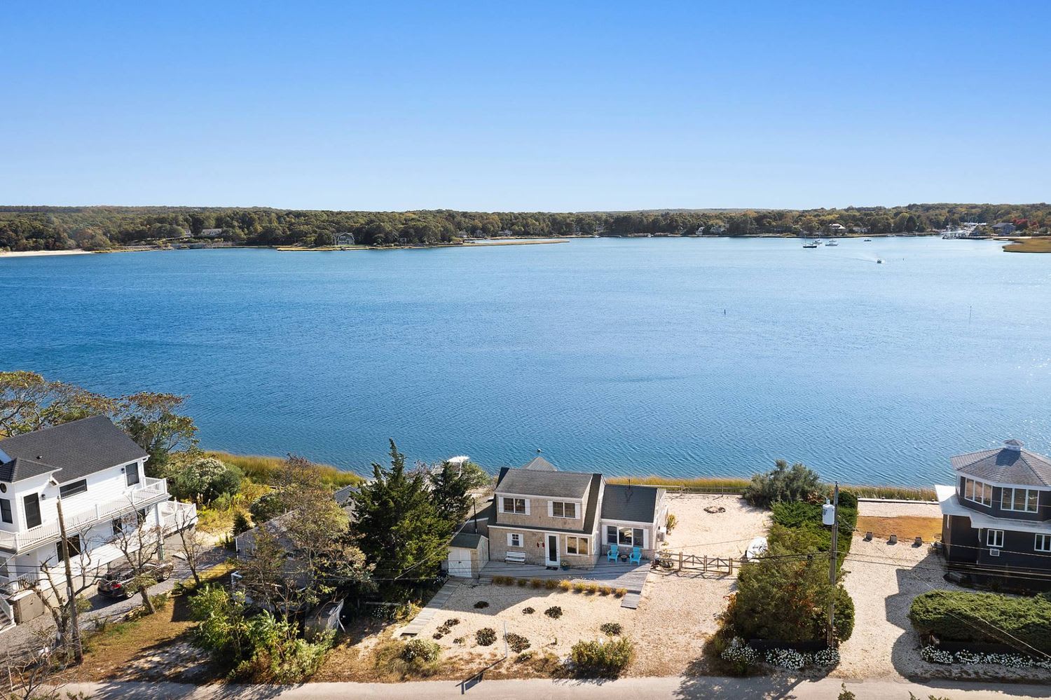 Panoramic Waterfront Vistas in a Coveted Harborside Neighborhood