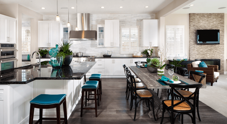 A modern kitchen and dining area, showcasing a clean and stylish interior design.