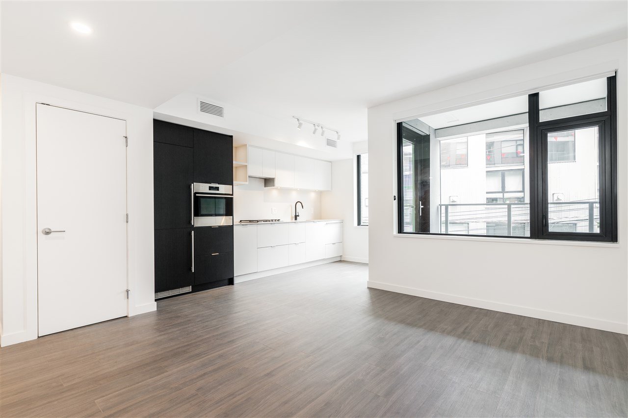 411-210 E 5th Ave