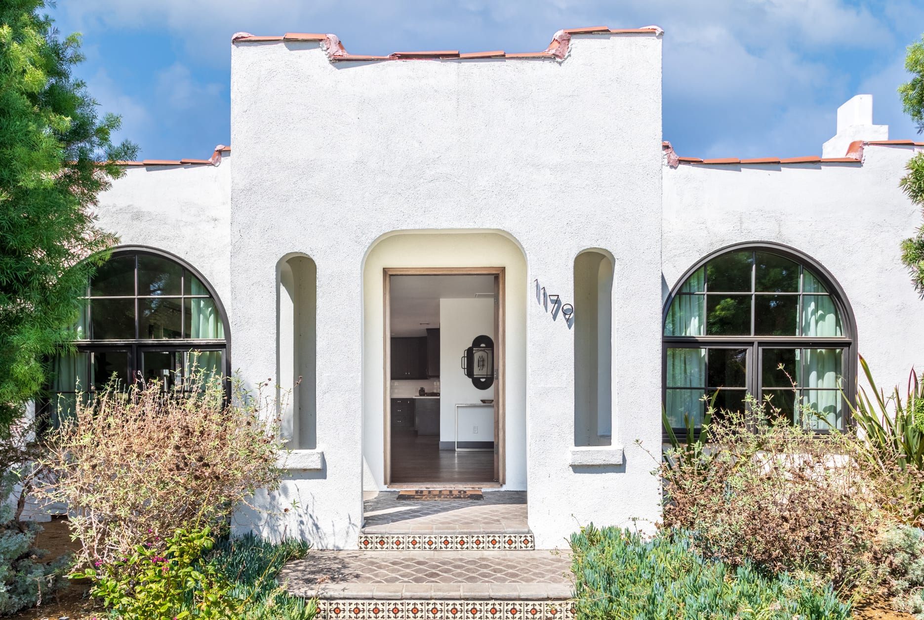 Re-imagined Spanish Modern Home in Coveted Longwood Highlands