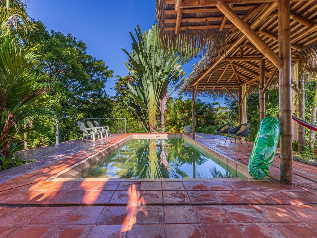 Villa Tres Vistas, a stunning luxury home located on the desirable Calle Perezoso in Ojochal