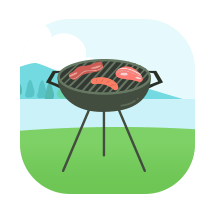Charcoal barbecue grill with food cooking outdoors.