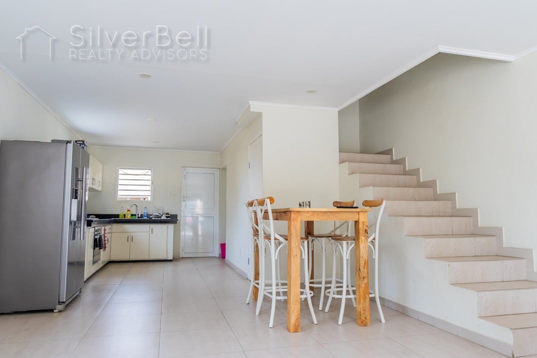 Welcome to this fully furnished apartment, located in Amandelweg, Dominguito, Curaçao where every bedroom is equipped with air conditioning and 5 minutes away from Mambo Beach. SilverBell Realty Advisors - Curaçao