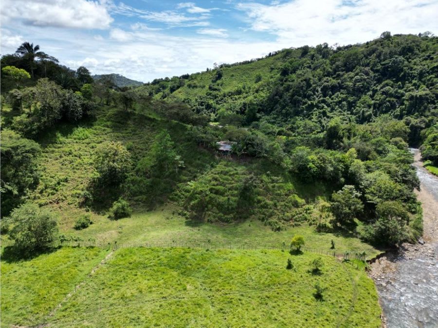 Farm with Mountain Range and River