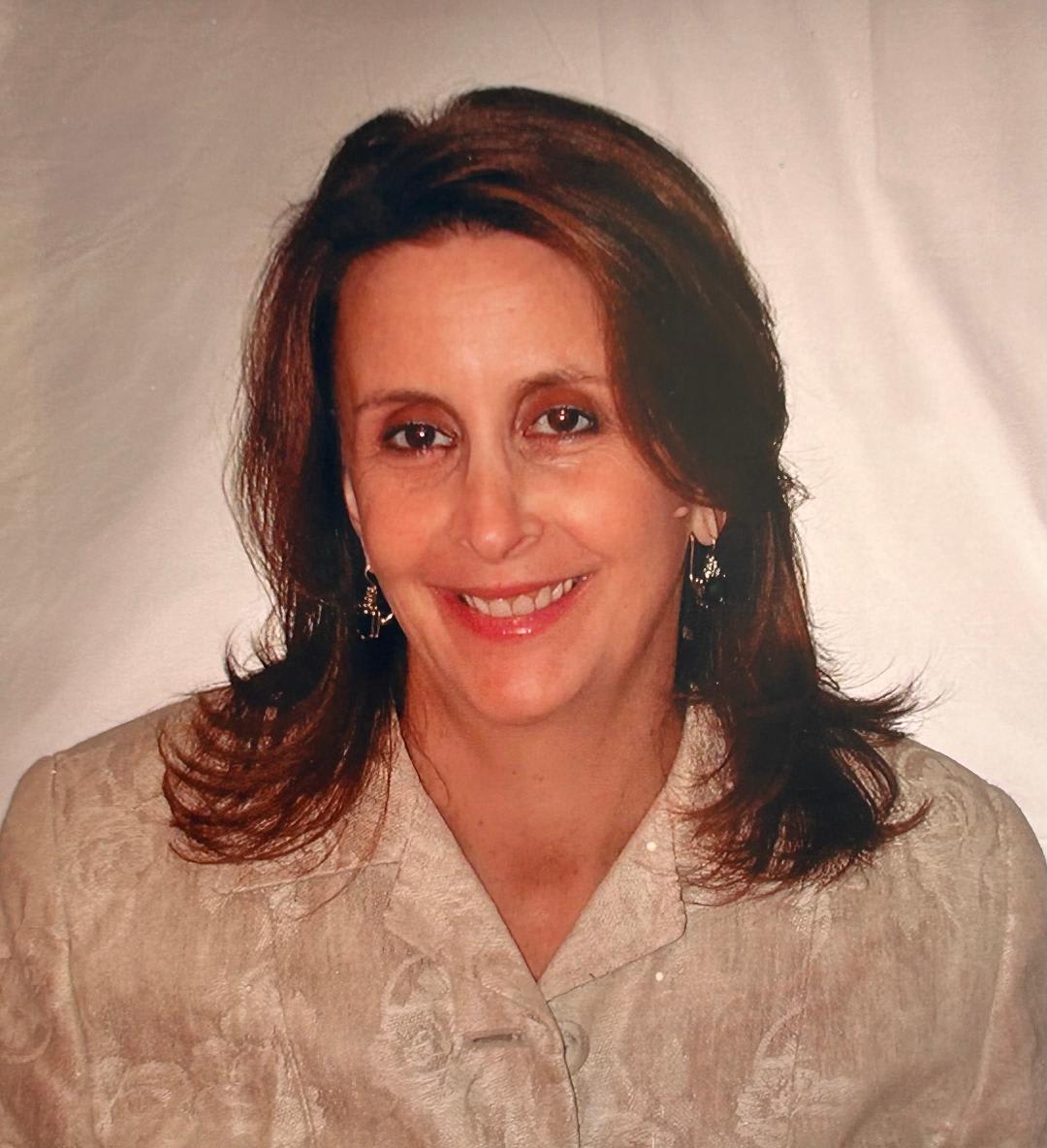 Michelle  L. Tawil