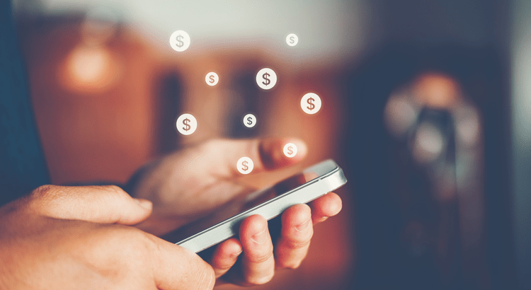 A person using a smartphone with financial icons floating above it, likely related to home price trends or mortgage rates.
