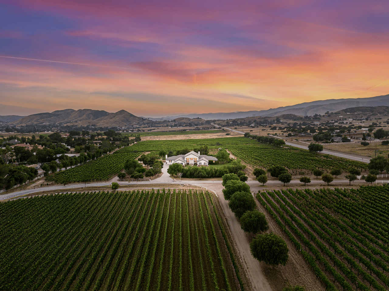 Colonial-style 5-bedroom residence on a Los Angeles winery and vineyard estate for sale.