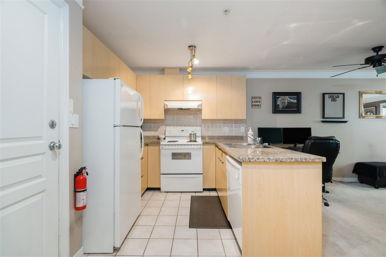 205-8115 121a St