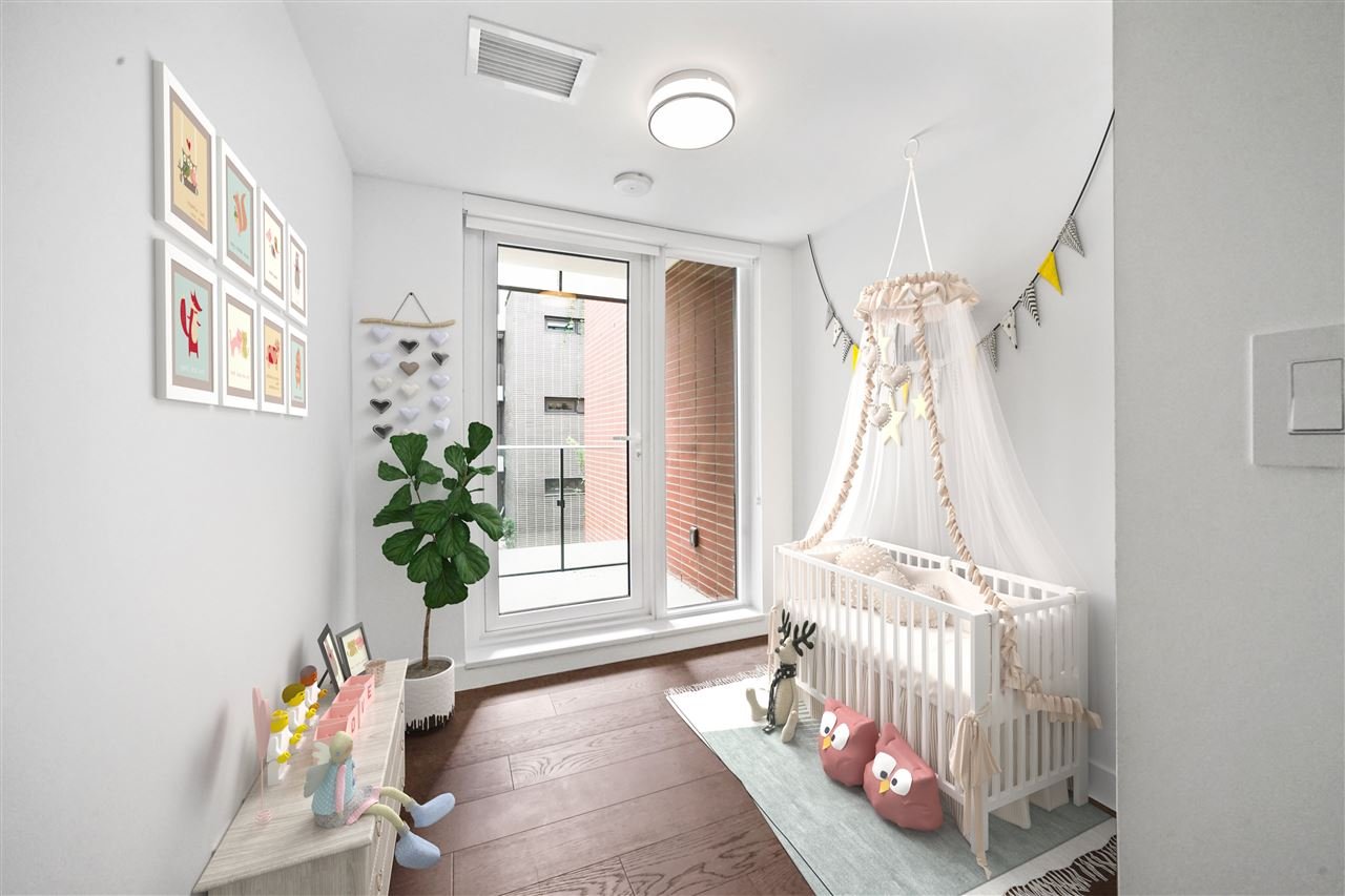 203-7128 Adera St