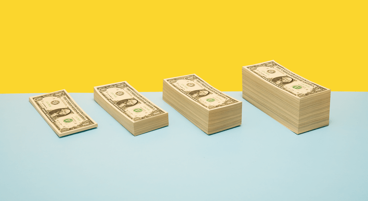 Four stacks of dollar bills against a yellow background, indicating themes related to home pricing or financial advice.