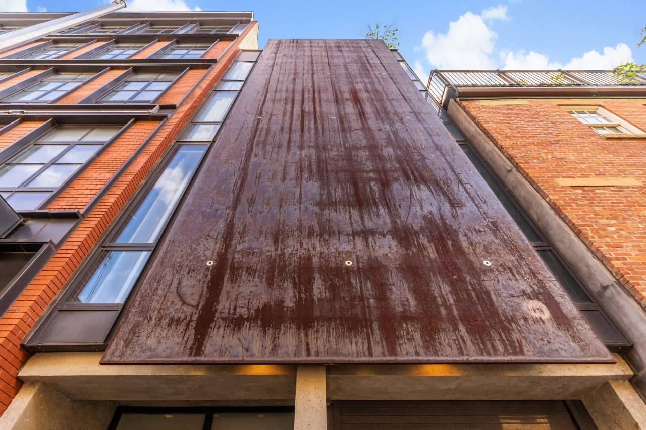 Manhattan Townhome With Unique Steel Facade Finds Buyer