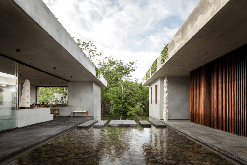How to Integrate Water Into the Design of a Haus? Ponds, Pools, and Rainwater Treatment