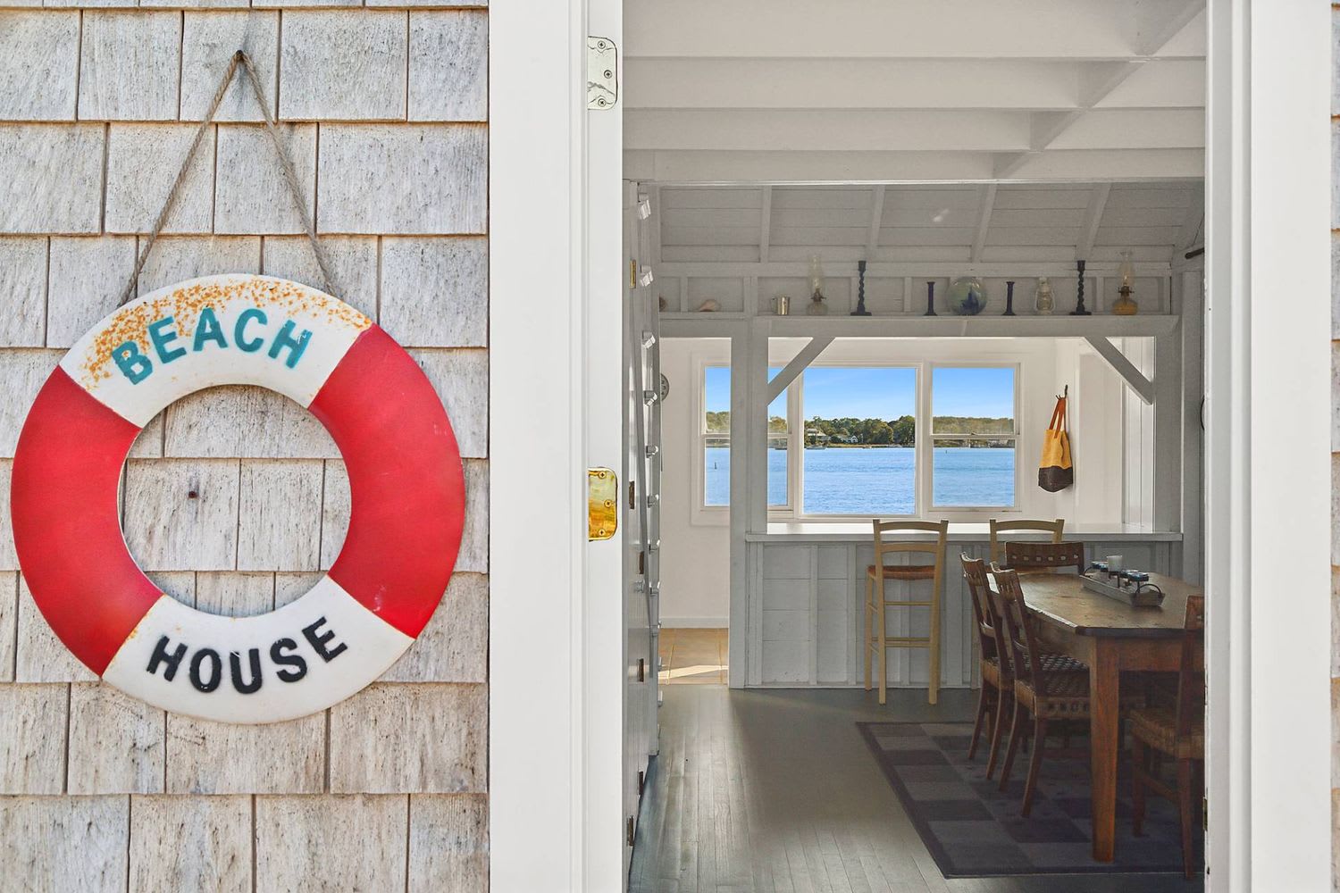 Panoramic Waterfront Vistas in a Coveted Harborside Neighborhood