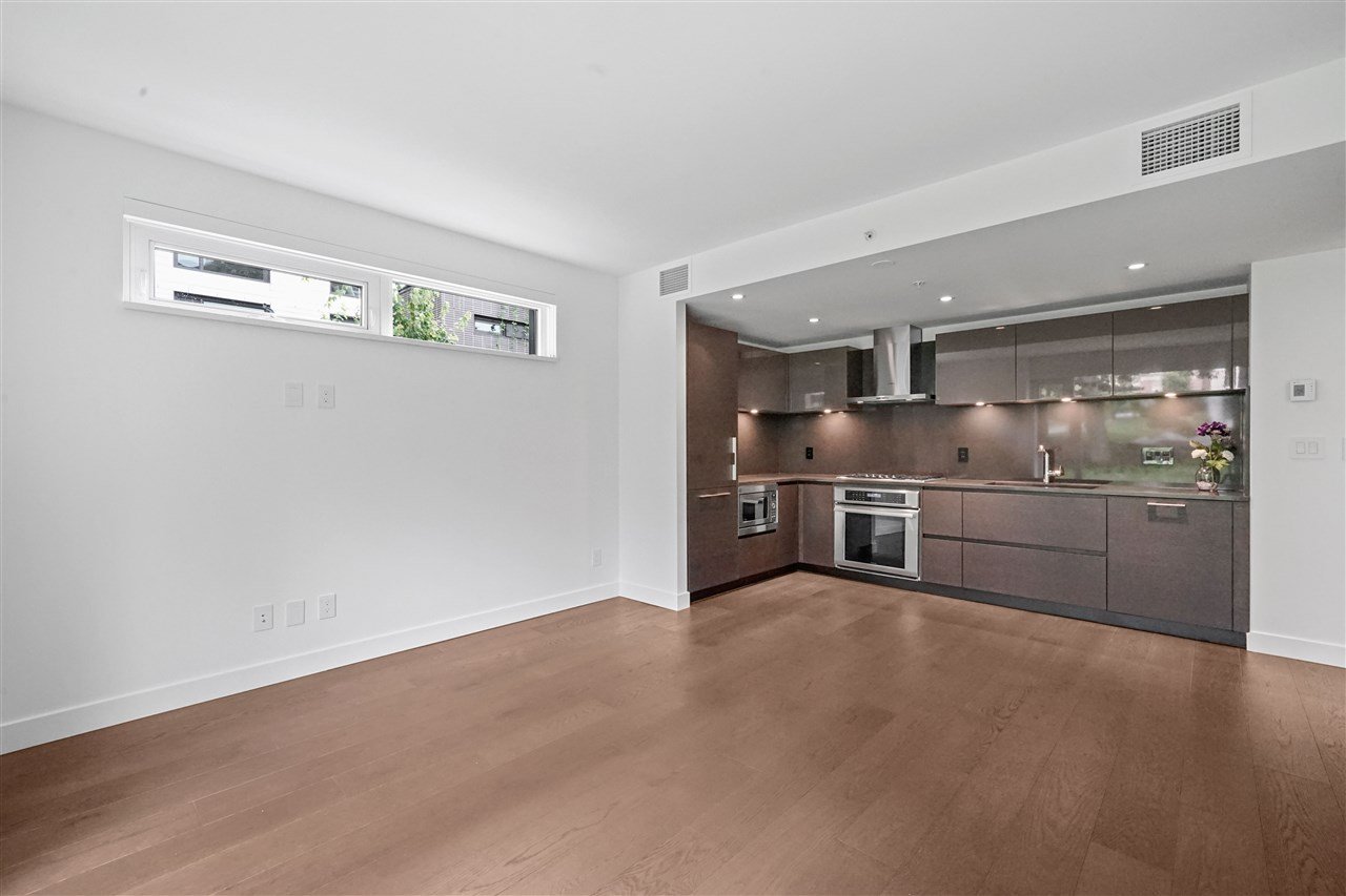 203-7128 Adera St