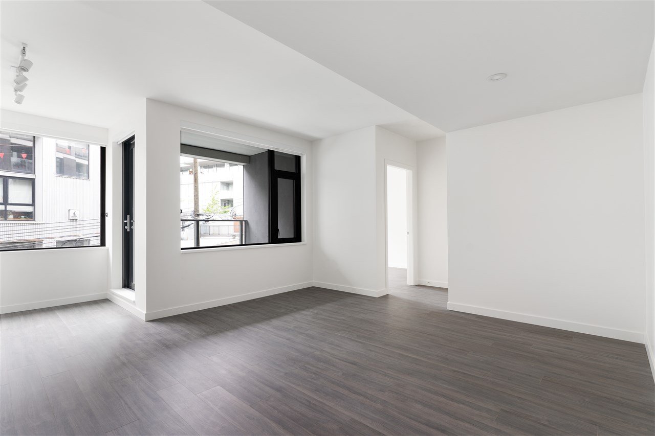 411-210 E 5th Ave
