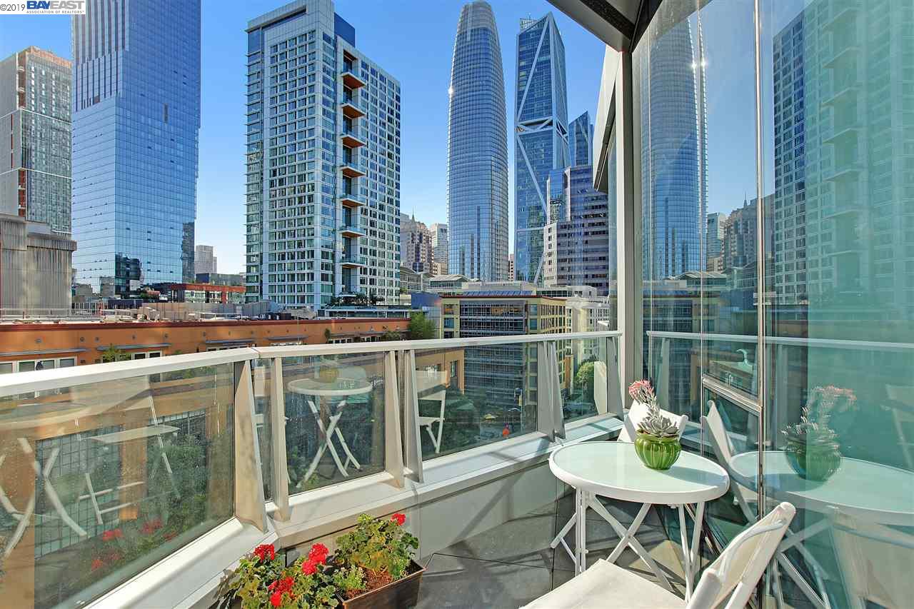 Balcony view from a unit at 333 Beale Street in San Francisco, California, featuring Salesforce Tower and surrounding high-rise buildings in the downtown skyline.