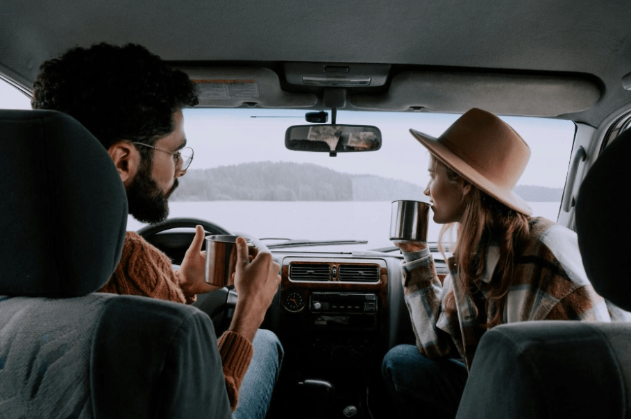 two people in a car