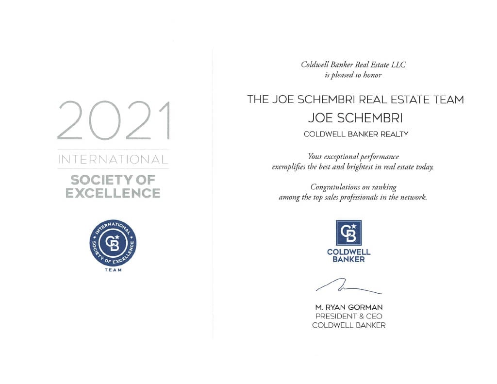 A white certificate for the "2021 INTERNATIONAL SOCIETY OF EXCELLENCE" award from Coldwell Banker. 