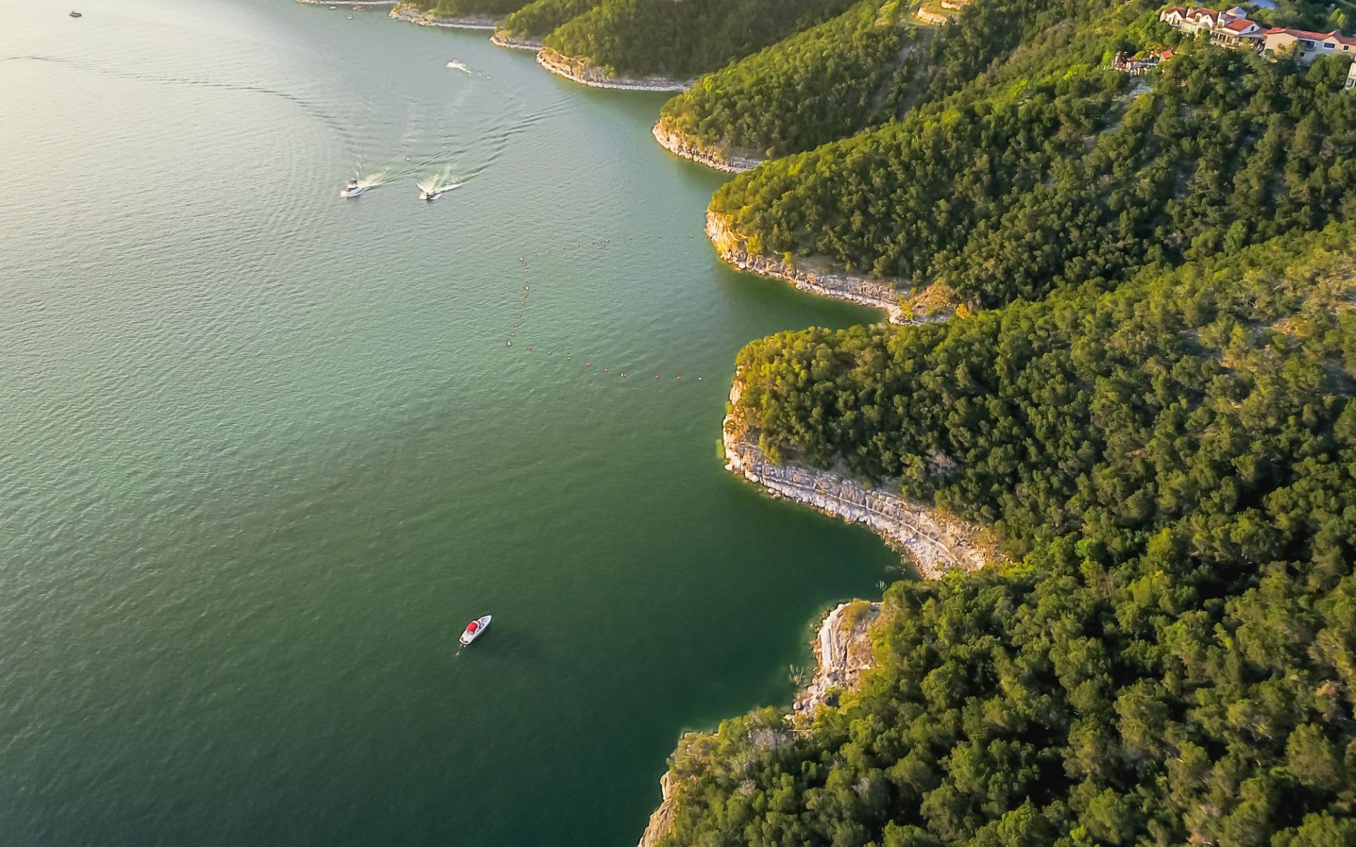 Lake Travis, Texas &ndash; Aerial view of the lake, luxury homes, and Hill Country landscape