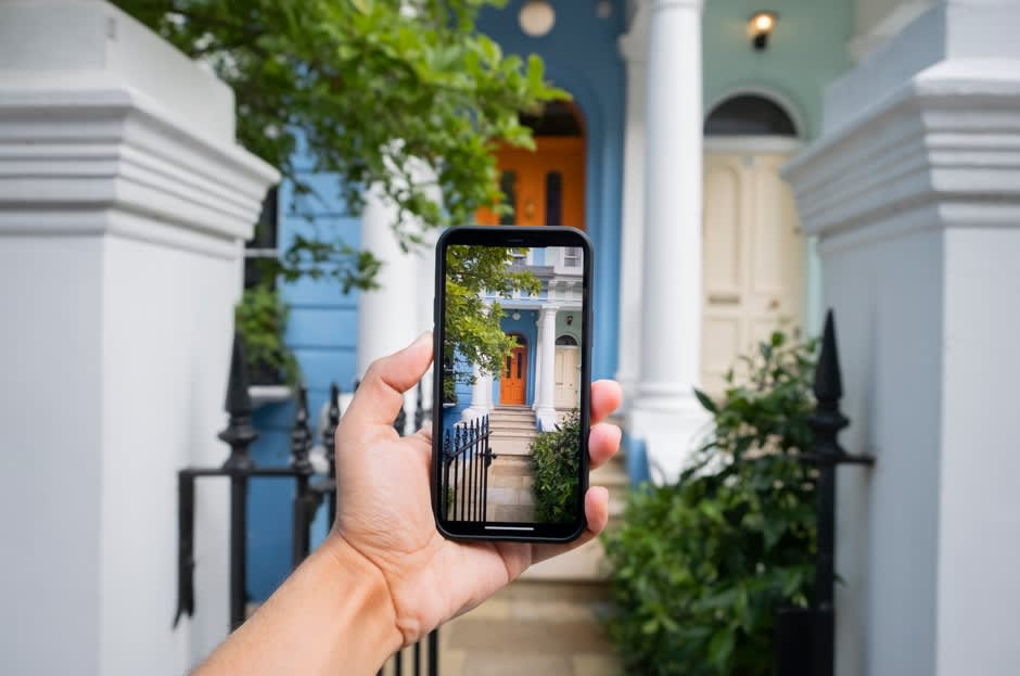 taking picture  of a house for sale