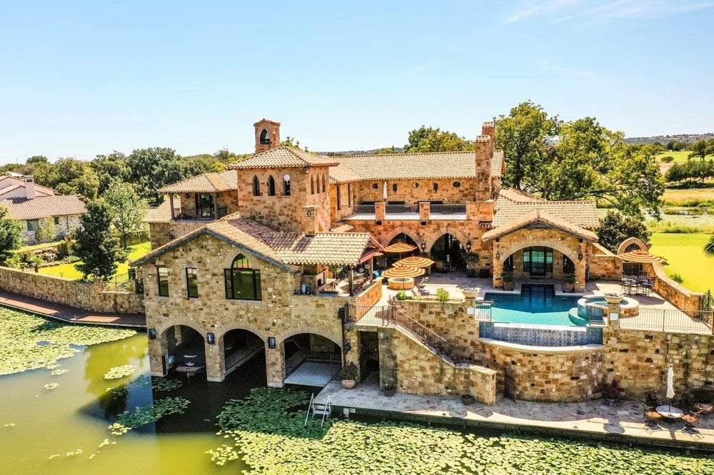 Dramatic Stone Villa Perched on the Edge of Horseshoe Bay Comes With Boat-In, Boat-Out Access
