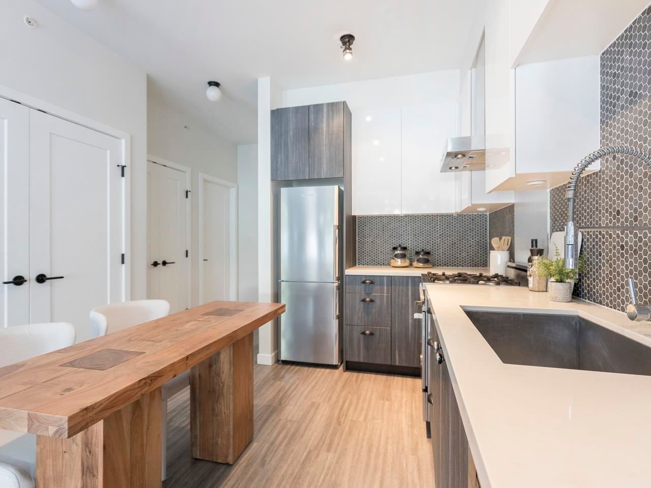 116-311 E 6th Ave