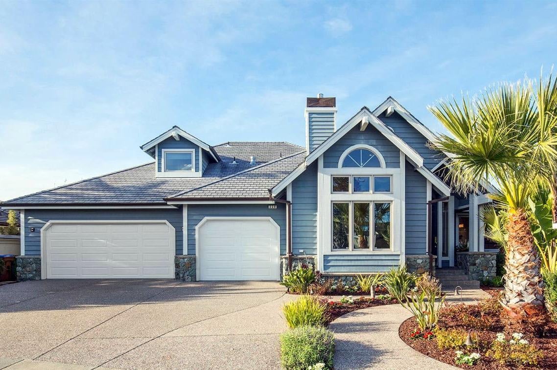 Dramatic Waterfront Home with Private Boat Slip- Represented Buyer