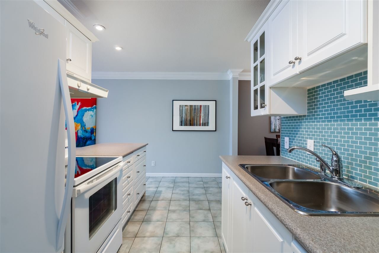 301-1640 W 11th Ave