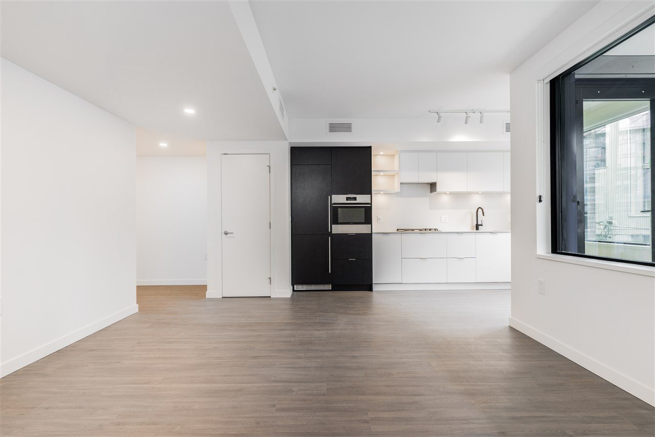 411-210 E 5th Ave