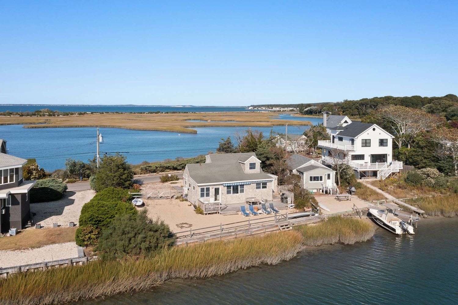 Panoramic Waterfront Vistas in a Coveted Harborside Neighborhood