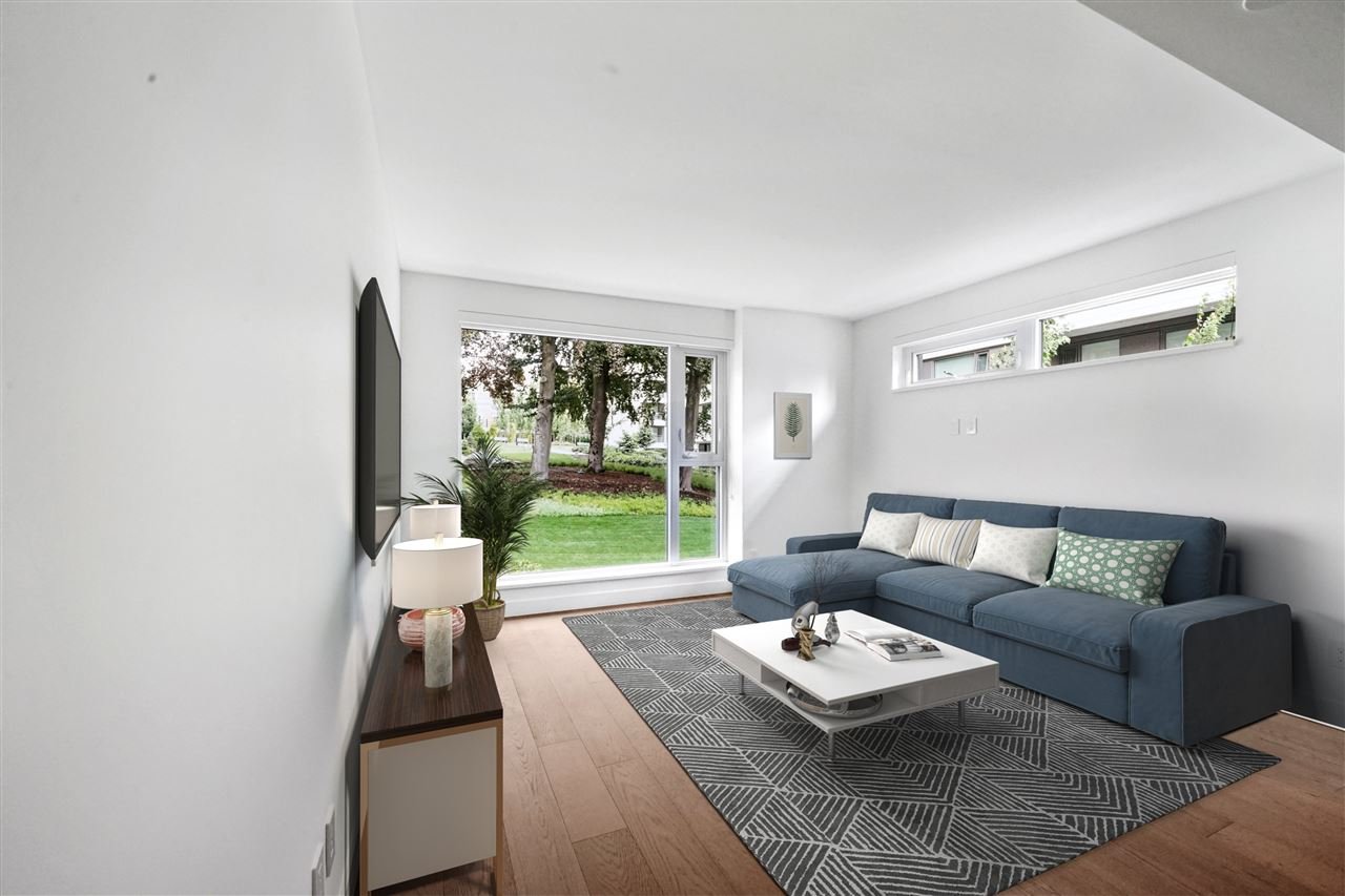 203-7128 Adera St