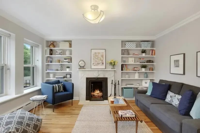 This Fort Greene two-bedroom has a fireplace and deck, if you don't mind a top floor walkup