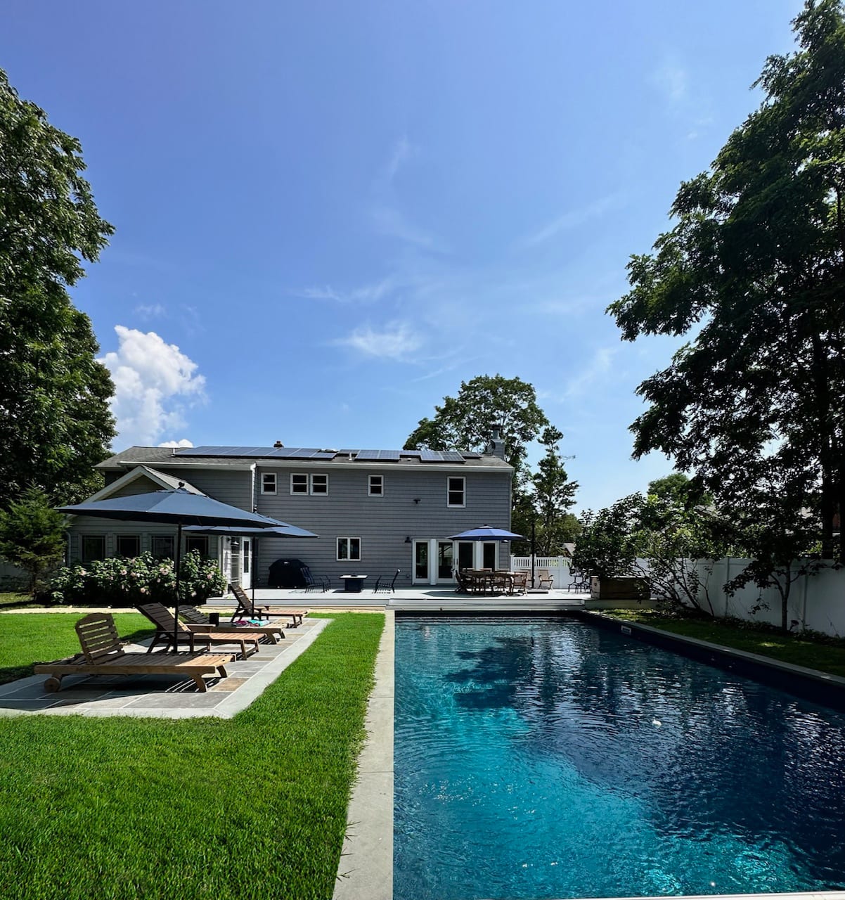 LIGHT-FILLED HOME WITH OVERSIZED POOL