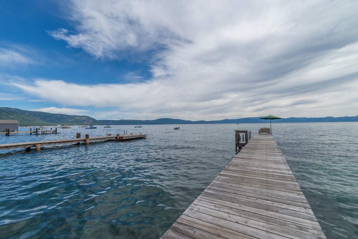 West Shore Lakefront With Private Pier & Buoy