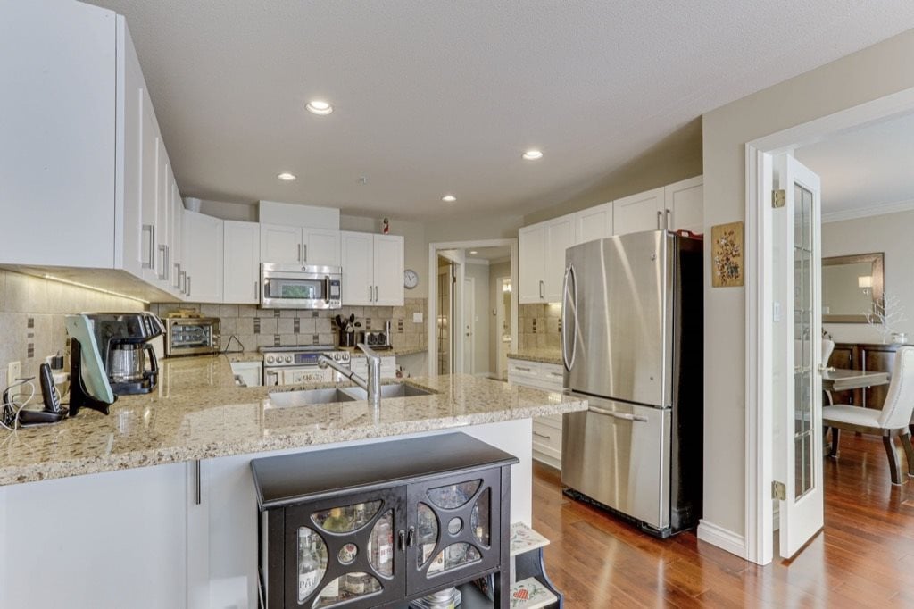 103-1250 55 St