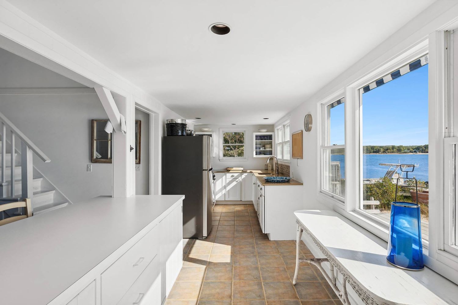 Panoramic Waterfront Vistas in a Coveted Harborside Neighborhood